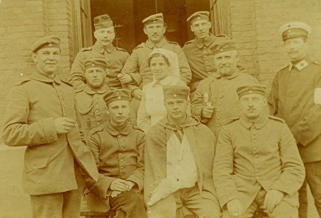 Patients from an assortment of units at a field hospital in Flanders, early 1915