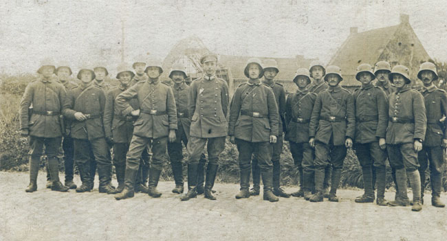 Leutnant Konrad Mann, adjutant of I. Batl. / IR 179, with the battalion's Meldeläufer in September 1917