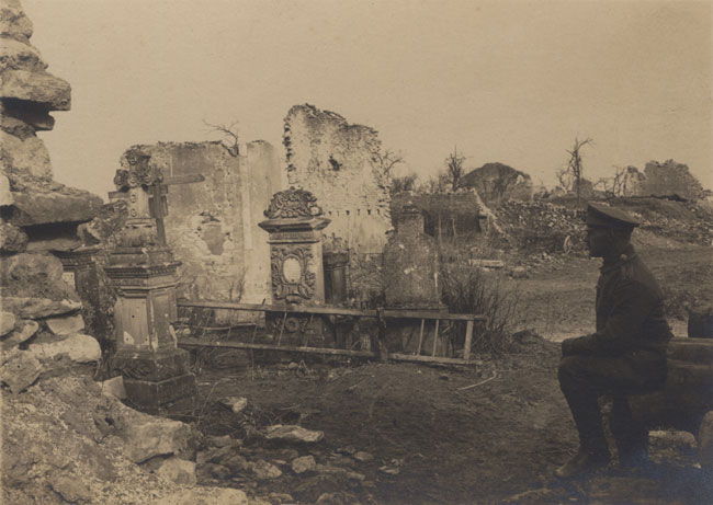 Offiziersstellvertreter of IR 133 (or possibly RIR 133) contemplating a devastated civilian cemetery somewhere in northern France